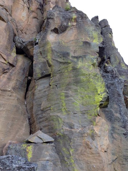 Oregon Yosemite ascends the left refrigerator block to a no hands rest. Bolt placements move you back out to a slopey crux. before the chains. Cool movement!  