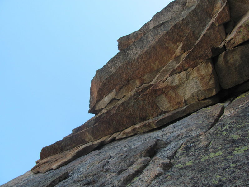 slightly zoomed in view of the tiered roofs traverse, from the bolted belay, plenty of pro possible but backclean/extend to minimize rope drag