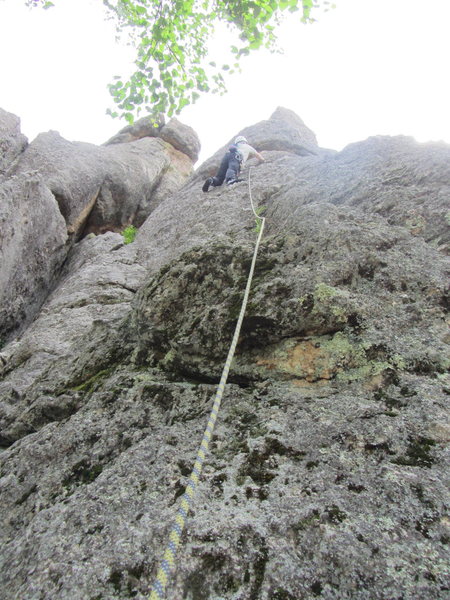 Paul Huebner heading up towards the second bolt.