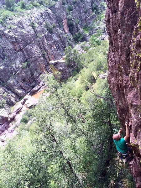 Aaron working the route prior to bolting