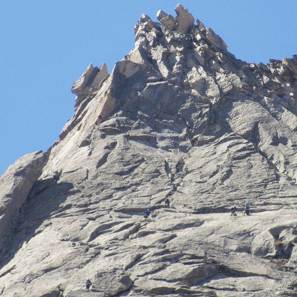 Bottom left is belaying at the start of the 4th pitch. Small red dot in top left is belaying at the start of the 6th pitch.