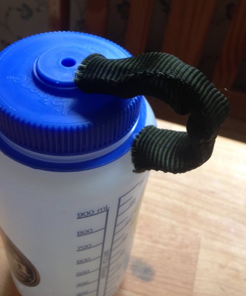 Bottle cap strap protector