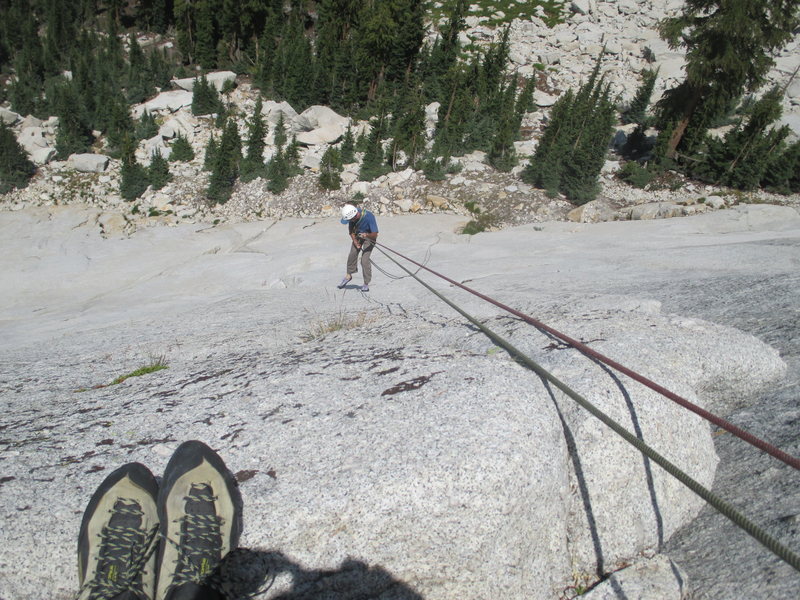 Tom Rogers rappelling the slab of Pedestal Center.