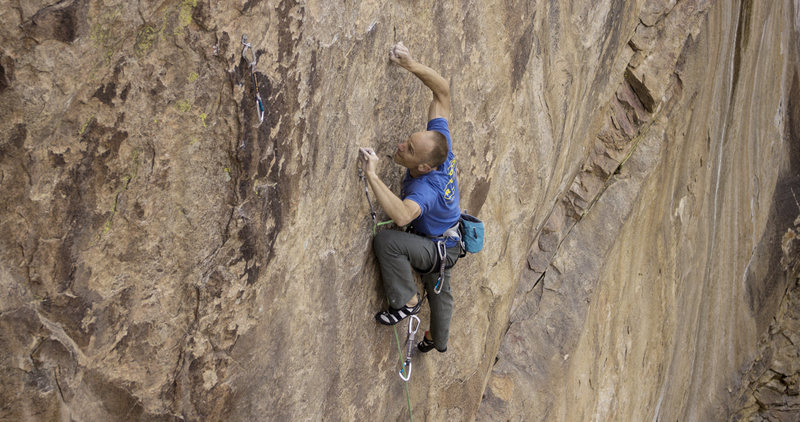 Mike Anderson working through the crimpy crux of The Legacy, 14a.