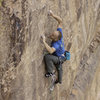 Mike Anderson working through the crimpy crux of The Legacy, 14a.