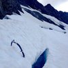 Crossing the bergshrund in late summer.