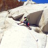 Morgan on the first ascent of Slow-speed Chase.<br>
The orange roof that marks the area can be seen above. 