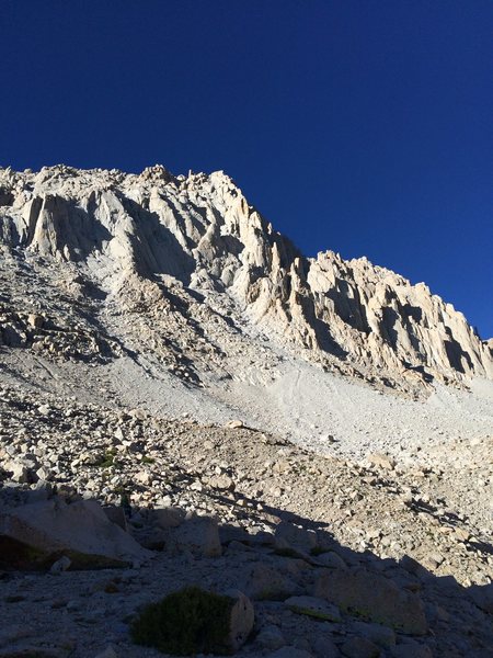 Rest & Be Thankful (V 5.10a 2,000'), Mt Langley. The route follows the prominent central arête directly to the summit.