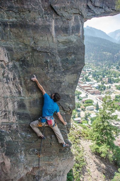 Working through the pre-crux moves.<br>
<br>
Photo by Monika Leopold.