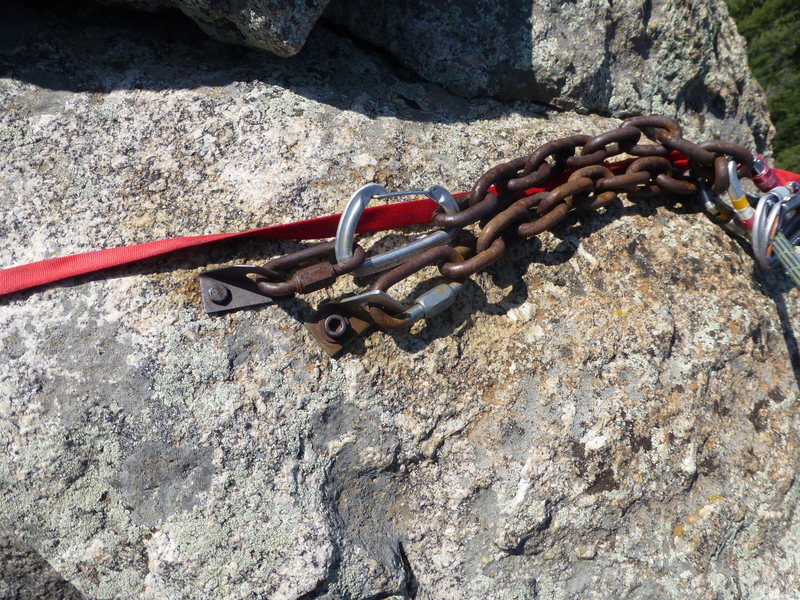 Summit anchor before replacement. Both of these are drop-in bolts (aka self-drills), although you can't tell until unscrewing (they could be other types). Note that the bolts are way too close together.