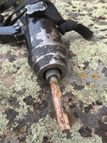 Steve was able to remove this lone, rusty bolt with the Greenlee tool.  We then reused the hole for our first bolt placement.  