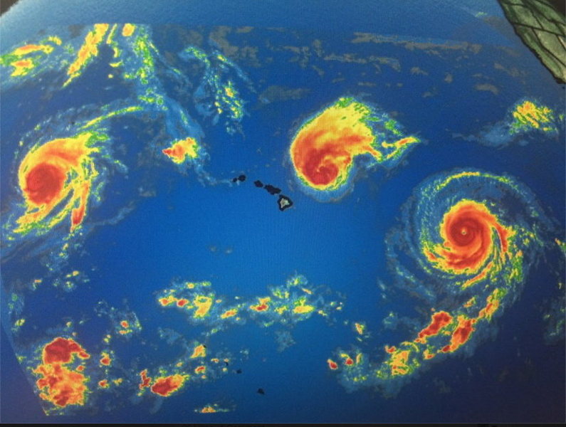 3 hurricanes surrounding Hawaiii and ANOTHER tropical disturbance born today.<br>
