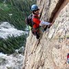 Coming up the crack to the bolted belay below the triple roofs.