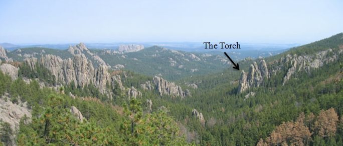 Grizzly Bear Creek as seen from the saddle behind the Cathedral Spires. The Torch is an easily identified point of reference.