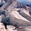 Crossing a ladder on the upper Ingraham Glacier, September 12, 2015