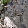 High Times, on the Crescent boulder, about 10 feet left of the crescent.