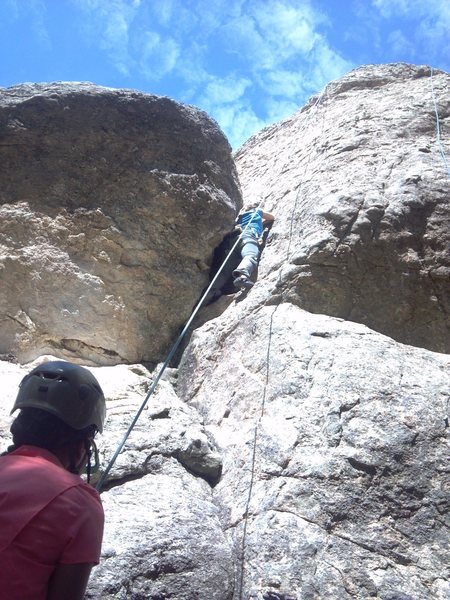 The base of Inspiration, pulling the direct start on the arete makes it bit more challenging and fun