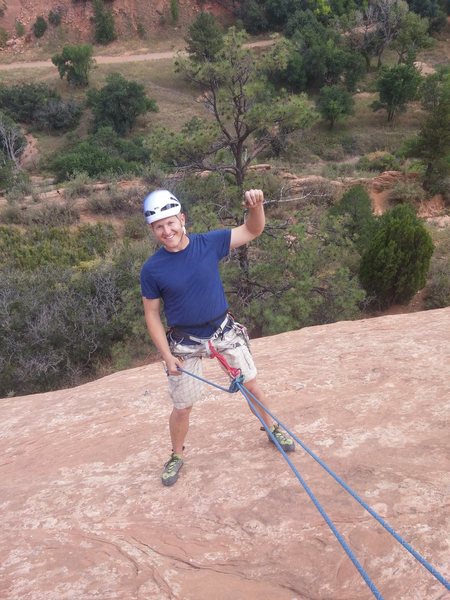 Fist pump before abseil from The Good Stuff at Red Rocks Canyon.