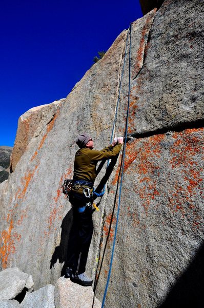 Richard Alden beginning "One Crack Below" (5.10a)