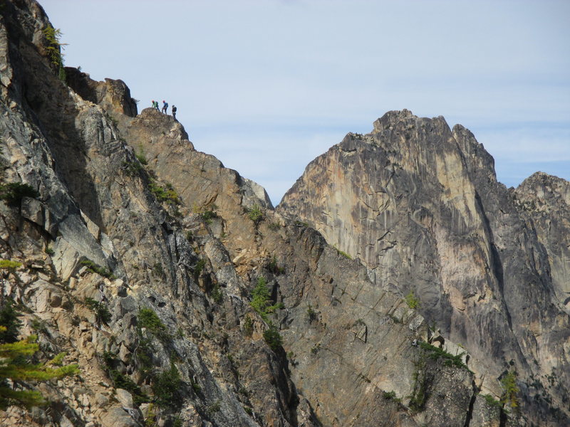 Josh Kling, Erik Leidecker, and Paul Koubeck on House Buttress, Poster Peak, with the Early Winter Spires in the background.