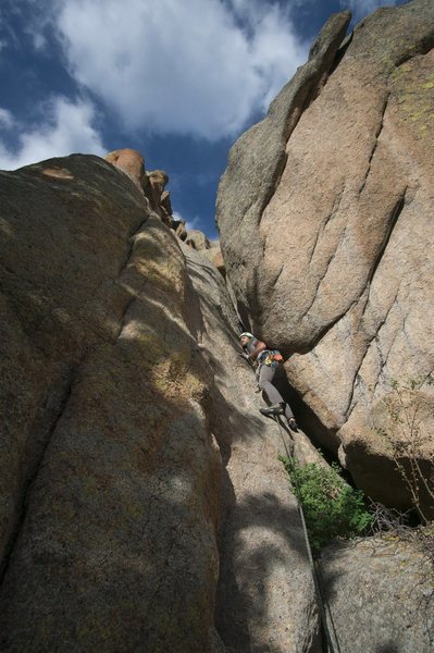 Alex fighting the good fight (wrong shoulder in, IMO). The most fun I've ever had on a squeeze chimney. 