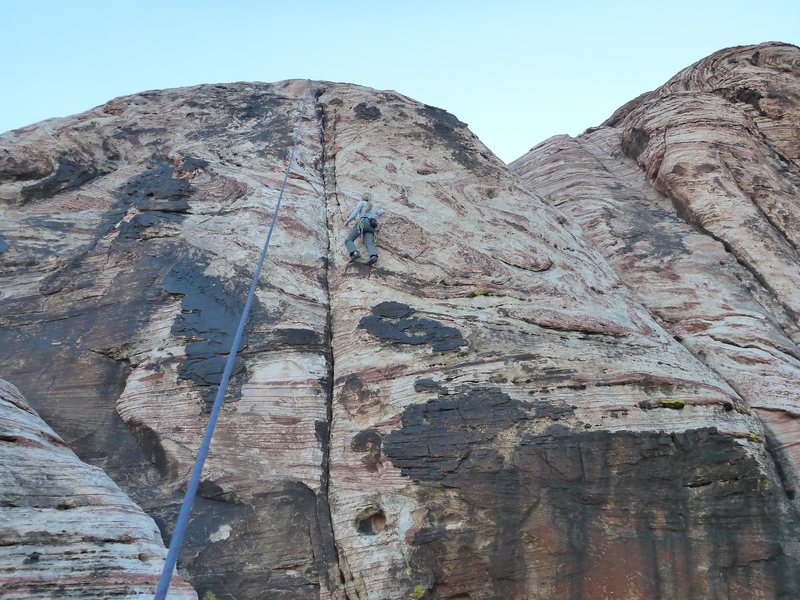 Alyse at the crux of the route.