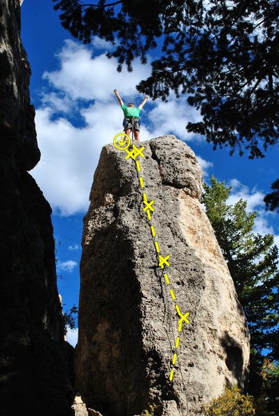 On top of the pinnacle! You can rap off the anchor or continue to the top for another rap bolt.