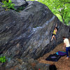 Unknown climber working The Flake V1 - East Face - Rat Rock