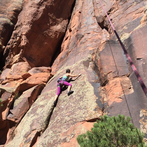  Renee Nall climbs through the beginning face moves on Superette.