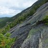 Looking north from about midway up the slide. Lots of cool green lichen on the slab.