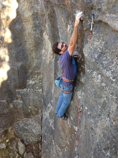 KW reaching into the start of  the crux