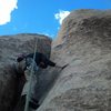 Hagny working the crux, looking for crimps.