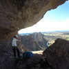 Kristi at the belay anchors for the first part of Monkey Space. This is in the cave at the back of the monkey's head.