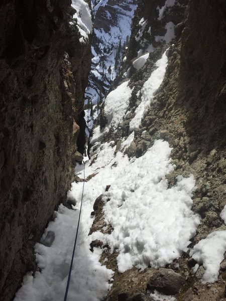 Looking down mid-way up a snowy, icy third pitch. It seemed to have potential to form a good ice climb.