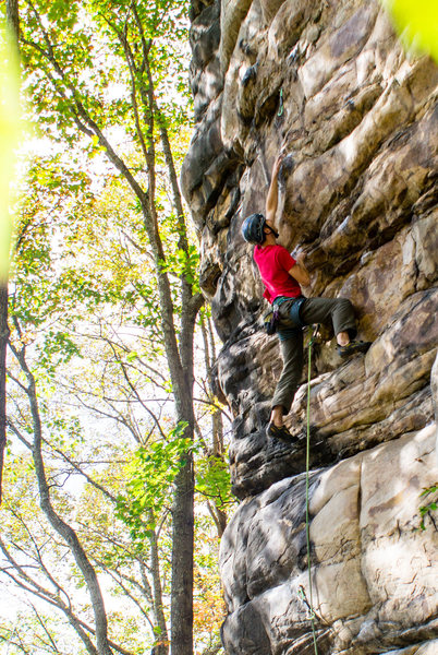 Greg Larsen launching off for the redpoint of Michelin Man (11d) on Ames Wall at Bubba City. Fall 2015. Photo by Jeff Dunbar.