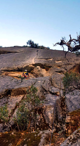 Jimmie sizing up the crux on Vanishing Point