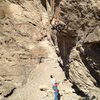 Passing the overhanging flake before the crux