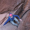 Jonathan Kriegel surmounting the crux, not too far from the end.