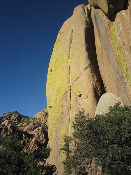 David Hein following John up the crux second pitch while Mica waits his turn to follow.