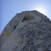 Looking up to the large triangular roof on P10 on the Beckey Route, Bastille Buttress.