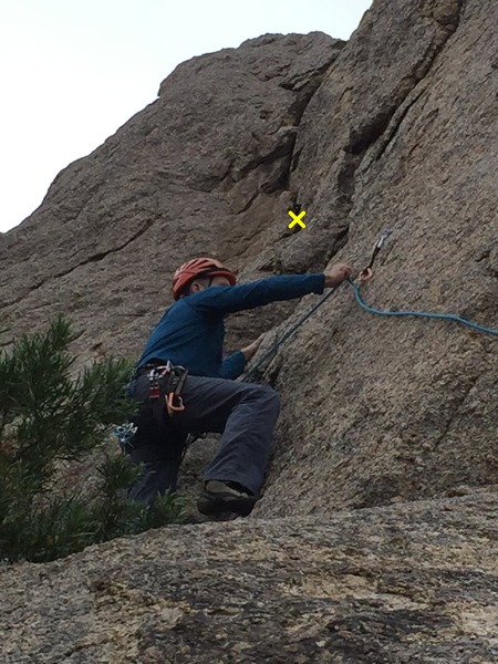 Left facing Dihedral to Left of "Shark Tooth" formation.  Piton just above yellow X in photo--last piece of fixed protection.