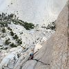 Amy Ness following the splitter towards the wild hand traverse below the summit.