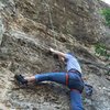 Partner working out the lower crux of Narthex (5.11a)