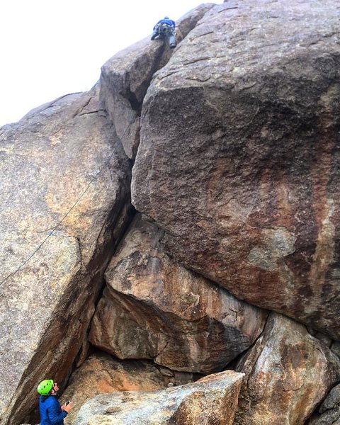 Some of the photos for this ascent were taken from straight below the chimney in order to illustrate the nature of the climb.  The person taking this shot was sitting at the anchors for Backbone--a 5.7 climb below and between Spinal Tap and Spinal Nerve.