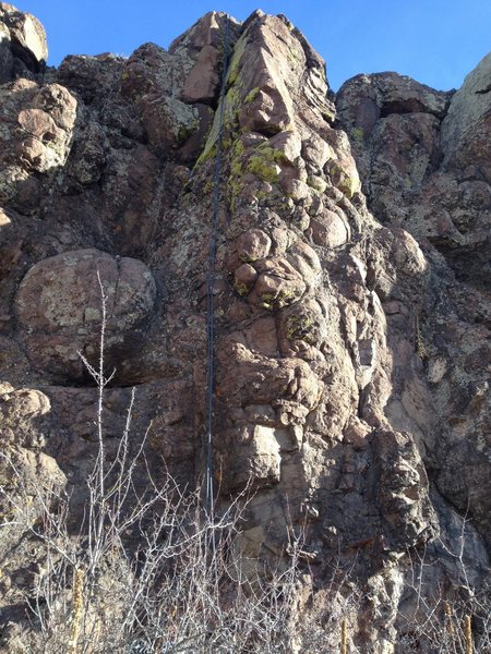 The rope is on the climb a bit left of the route shown in the original photo but anchored at the same place.