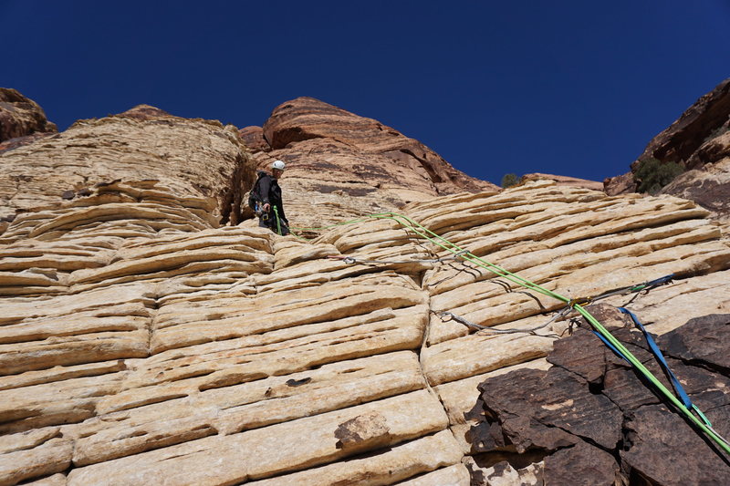 Brendan standing on top of the third pitch.