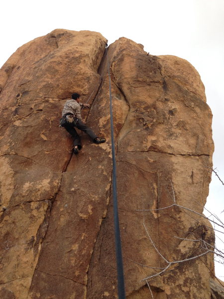 Rick on the crux move of Cats Claw.