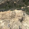 The second set of bolts on the top of the crag that are for the climber's left side of the rock. Both are old SMC hangers and rivet head bolts.