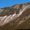 Central Couloir as viewed from Willey House (summer's "Main Slab" in dead-center of the photo; most of the lower couloir/gully is hidden behind the tree line)