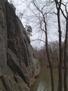 The middle of P2 of the Chris Wex Don Traverse. From this point, Chris and Robin ascended the vegetated crack to the top of the cliff. The original route, according to record, continued traversing around the corner until the cliff meets the hillside. 